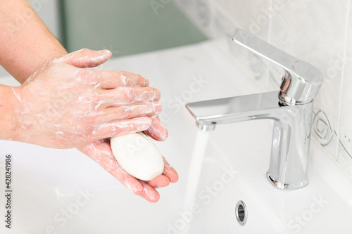 thorough hand washing with soap and water to prevent coronavirus - Image