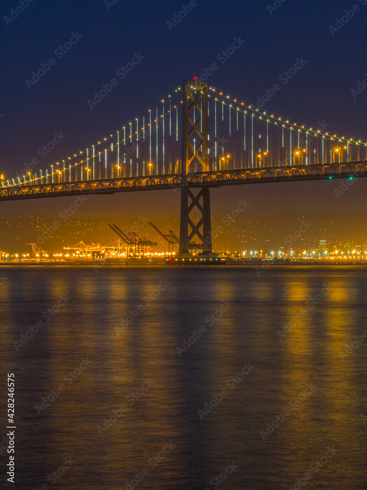 The double deck San Francisco–Oakland Bay Bridge, or Bay Bridge, 1936, is part of Interstate 80 and the direct road between San Francisco and Oakland California.