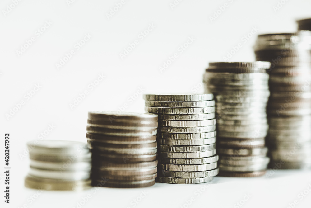 Gold coins stacks is representing riches and wealth management. Coin stack growing and find out the way to get a return on investment. Finance and money exchange investment as concept. Gold coins stacks is representing riches and wealth management. Coin stack growing and find out the way to get a return on investment. Finance and money exchange investment as concept.