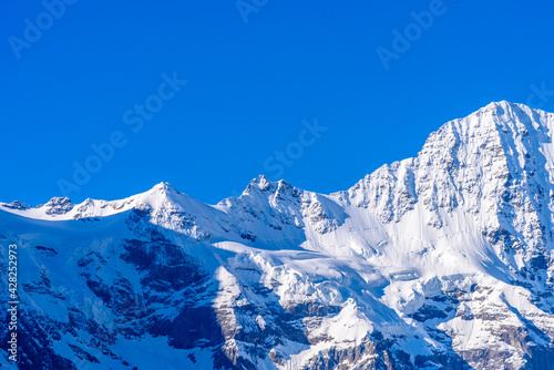The Swiss Alps at Murren, Switzerland. Jungfrau Region. The valley of Lauterbrunnen from Interlaken. Snow peaks. © karamysh