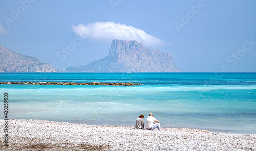 ALTEA, SPAIN - ABRIL 13, 2021: Couple enjoying sea views in Altea