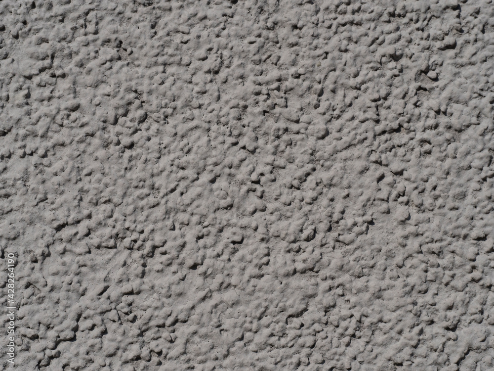 light grey rough grunge plaster with grain textured background light grey rough grunge plaster with grain textured background