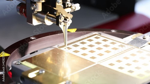 Microelectronic welding  machine in action