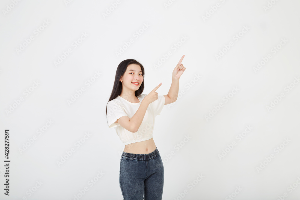 Asian woman pointing shows something Asian woman pointing shows something