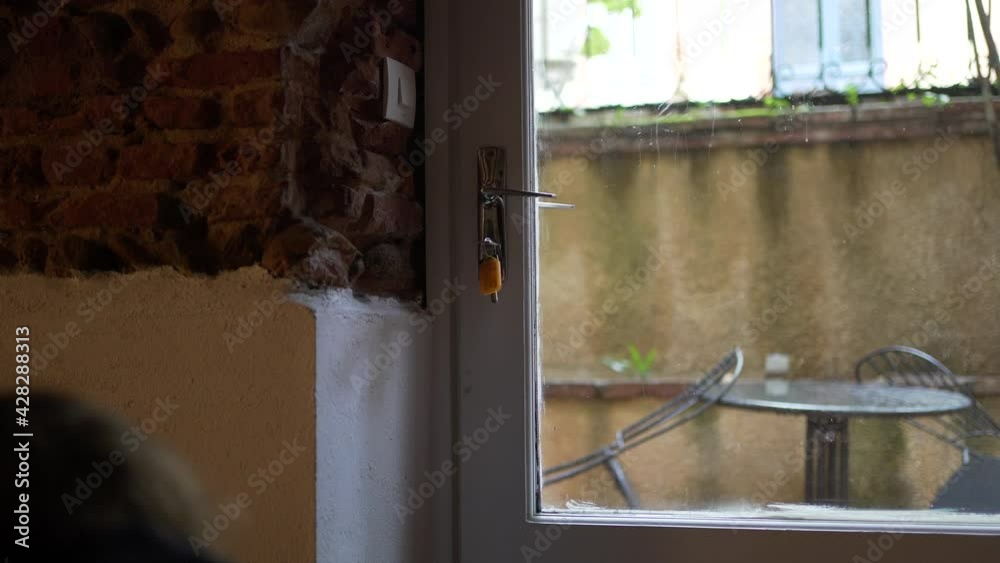 Shutting entrance door closing behind toddler Shutting entrance door closing behind toddler