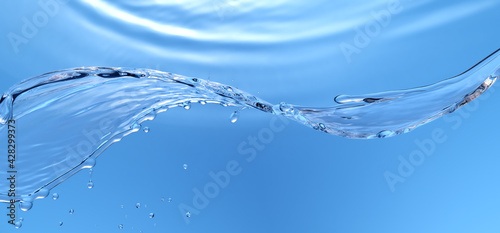 Water Stream splash on gradient background macro shot
