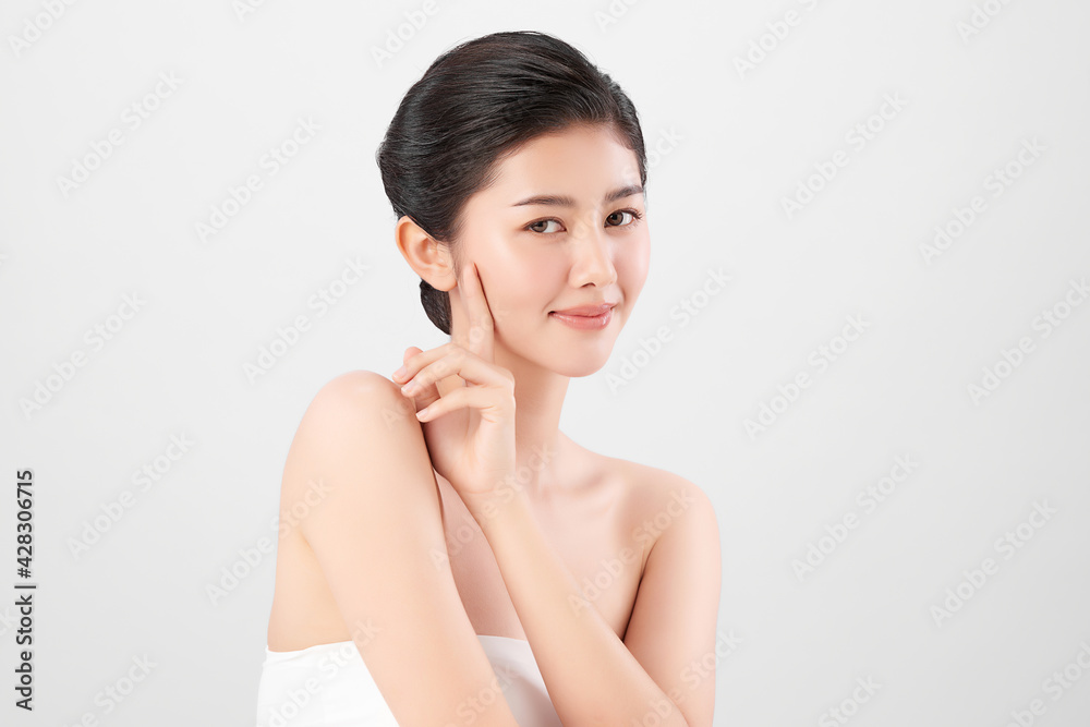 Beautiful young asian woman with clean fresh skin on white background, Face care, Facial treatment, Cosmetology, beauty and spa, Asian women portrait Beautiful young asian woman with clean fresh skin on white background, Face care, Facial treatment, Cosmetology, beauty and spa, Asian women portrait