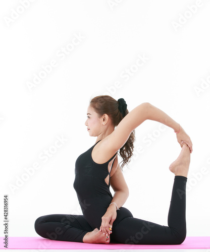 Asian professinal female teacher showing and demonstrate exercise and stretching body with yoga pracetice. Concept for health and balance life