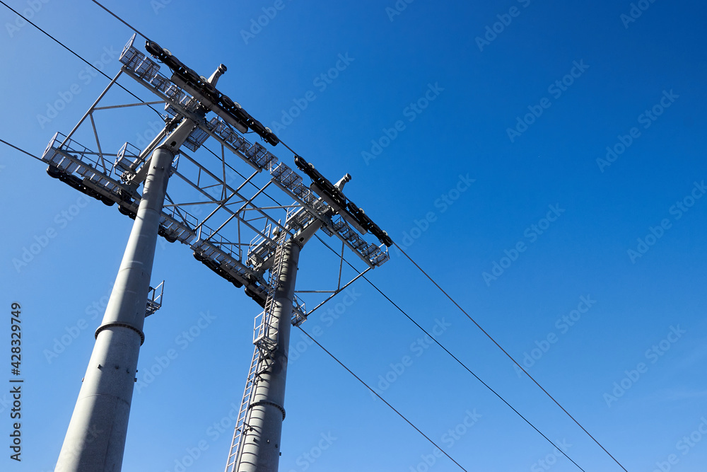 cableway support tower in a ski resort against the blue sky cableway support tower in a ski resort against the blue sky