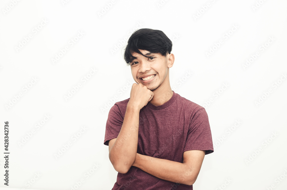 Smiling handsome Asian man in casual t-shirt Smiling handsome Asian man in casual t-shirt