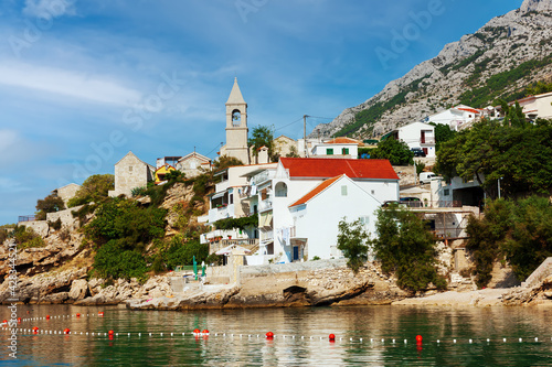 Pisak is a small tourist village located on the Omish Riviera. Dalmatia, Croatia photo