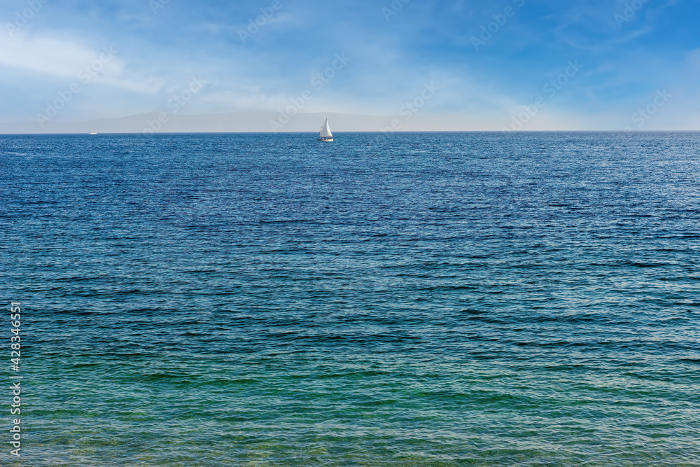sailboat on the horizon of the Adriatic sea