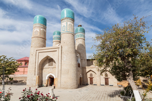 Chor-Minor Madrasah, Theological educational institution (1807) in Bukhara on a sunny day, Uzbekistan