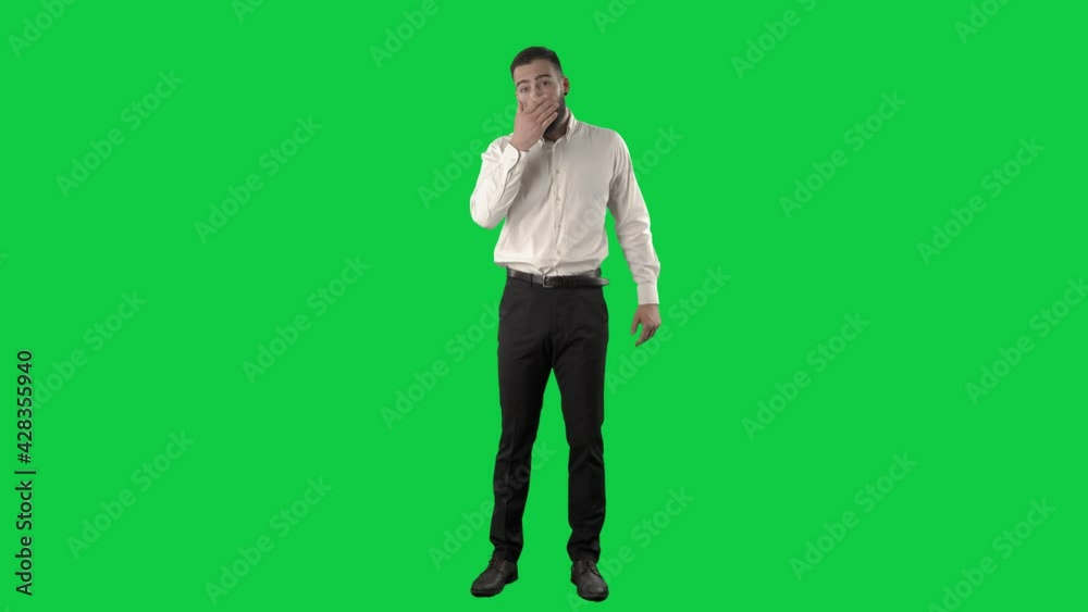 Handsome business man preparation routine getting ready for work. Full length on green screen chroma key background. Handsome business man preparation routine getting ready for work. Full length on green screen chroma key background.
