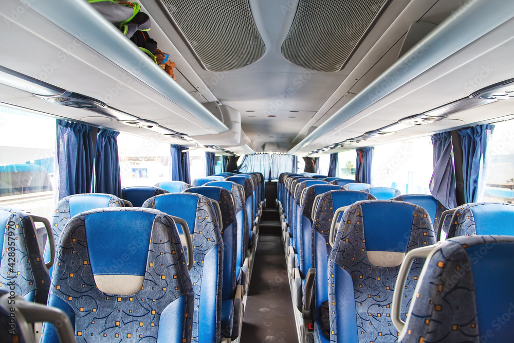 Fototapeta premium Public urban transport. Empty interior of the bus.