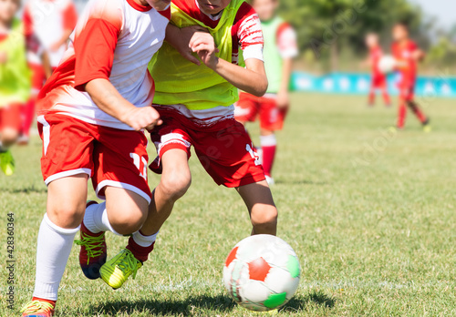 Fototapeta Naklejka Na Ścianę i Meble -  Football Soccer Kick. Soccer Players Duel.
