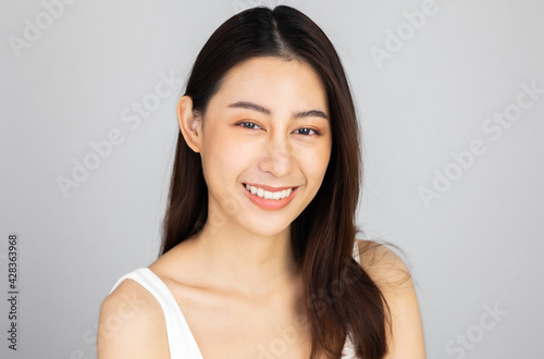 Beautiful Young Asian Woman short hair  with Clean Fresh Skin. Face care  Facial treatment  Cosmetology  beauty and healthy skin and cosmetic ideas concept.