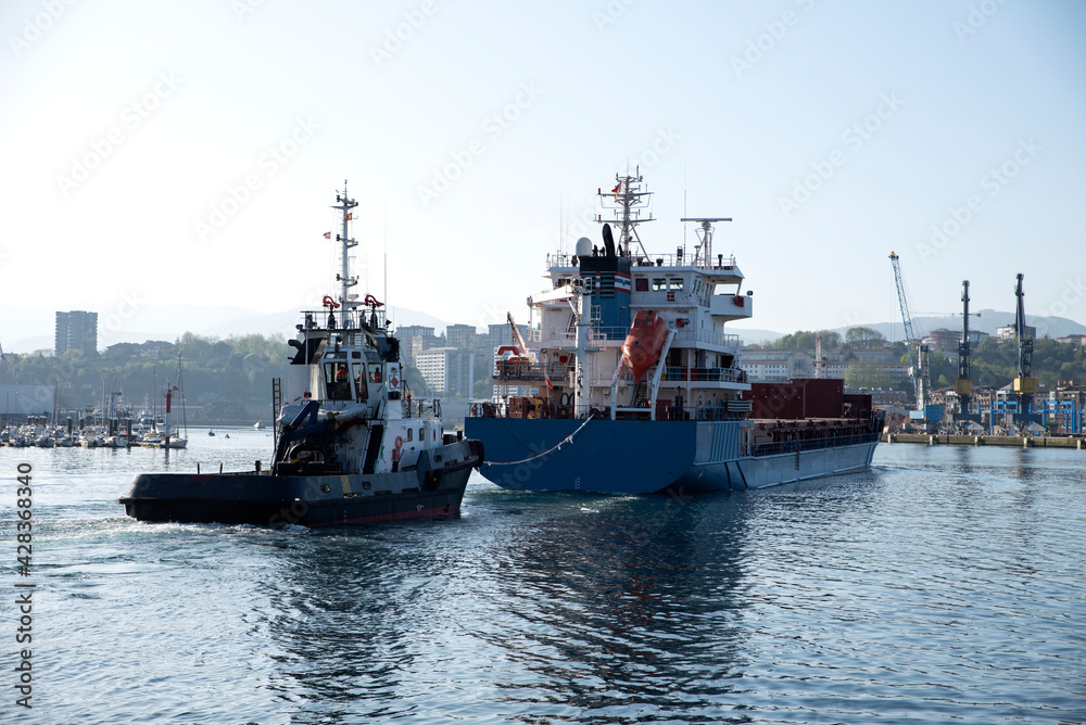 cargo ship entering a port