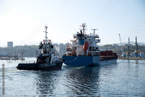 cargo ship entering a port