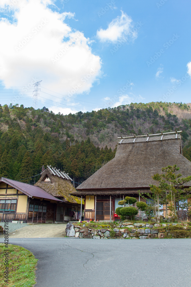 Fototapeta premium Thatched roof old house in Kitamura, Miyama Kayabuki no Sato, Nantan City, Kyoto Prefecture, Japan