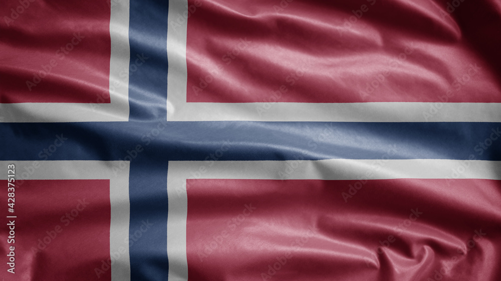 Norwegian flag waving in the wind. Close up of Norway banner blowing soft silk. Norwegian flag waving in the wind. Close up of Norway banner blowing soft silk.
