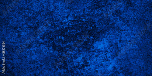 blue colored grunge wall texture for banner, backdrop
