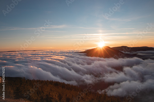 Obraz na plátně Photo shoot of sunset on Lysa Hora with a view of Smrk mountain in Beskydy mountains