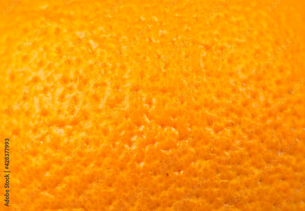 Close up photo of orange peel texture. Oranges ripe fruit background, macro view..Human skin problem concept, acne and cellulite. Beautiful natural wallpaper.