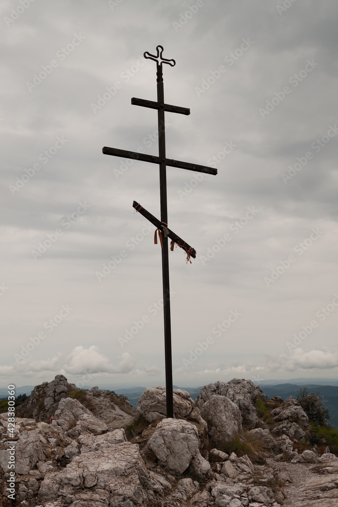 A commemorative metal cross installed at the top. A commemorative metal cross installed at the top.