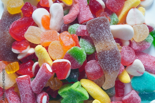A lot of colorful assorted gummy candies. Juicy colorful jelly sweets