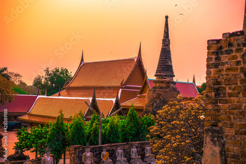 Background of old Buddha statues in Thai religious attractions in Ayutthaya Province  allowing tourists to study their history and take public photos.