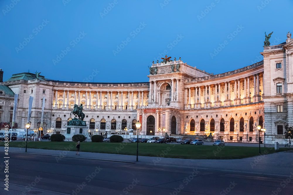 View of the Hofburg Castle from the Heldenplatz in the evening light. Vienna, Austria