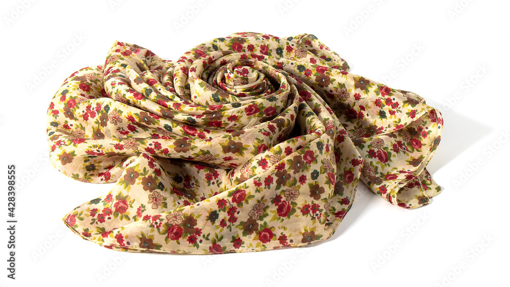 Beige silk fabric with floral pattern folded in a shape of the flower on a white background. Silk texture, backdrop, wallpaper. Beige silk fabric with floral pattern folded in a shape of the flower on a white background. Silk texture, backdrop, wallpaper.