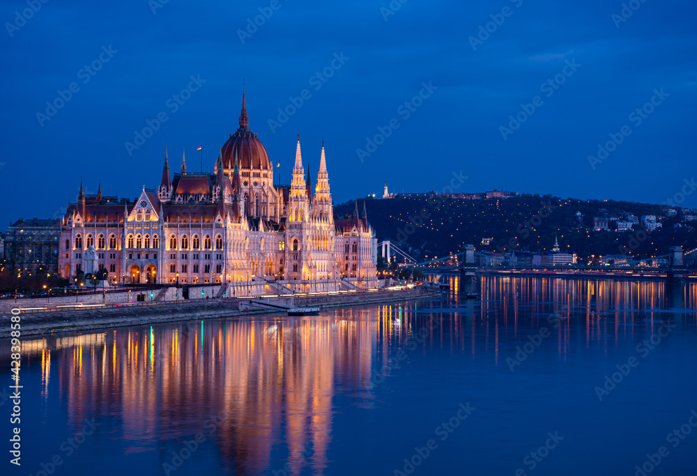Hungary, evening twilight in Budapest, parliament on the background of night city lights, cityscape