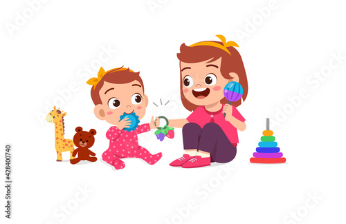 cute little girl play with baby sibling together