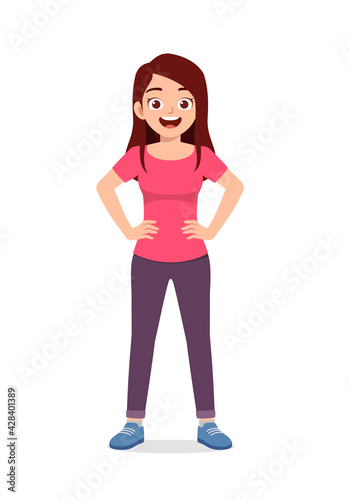 young good looking woman doing arm on hip pose with confident