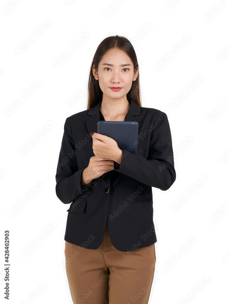 Young asian businesswoman in black suit holding a tablet computer in chest position with both hand. Portrait on white background with studio light. Young asian businesswoman in black suit holding a tablet computer in chest position with both hand. Portrait on white background with studio light.