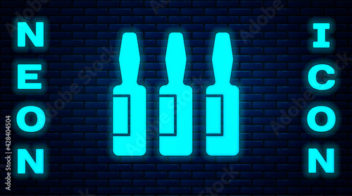 Glowing neon Medical vial, ampoule, bottle icon isolated on brick wall background. Vaccination, injection, vaccine healthcare concept. Vector