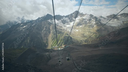 View from the cable car in the mountains. View of the slopes of Mount Elbrus. Caucasus, Russia.