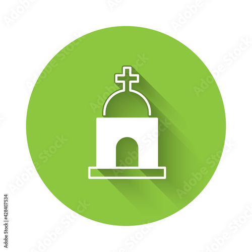 White Old crypt icon isolated with long shadow. Cemetery symbol. Ossuary or crypt for burial of deceased. Green circle button. Vector