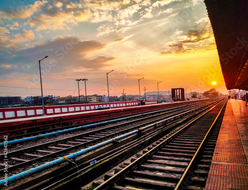 sunrise over railway tracks at morning from flat angle