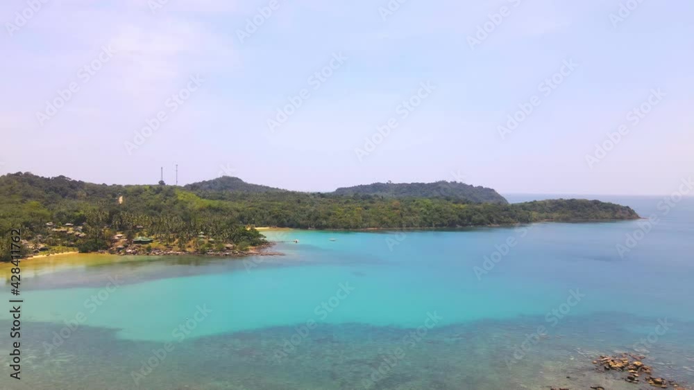 Aerial view of nature tropical paradise island beach enjoin a good summer beautiful time on the beach with clear water and blue sky in Koh kood or Ko Kut, Trat Thailand. Aerial view of nature tropical paradise island beach enjoin a good summer beautiful time on the beach with clear water and blue sky in Koh kood or Ko Kut, Trat Thailand.