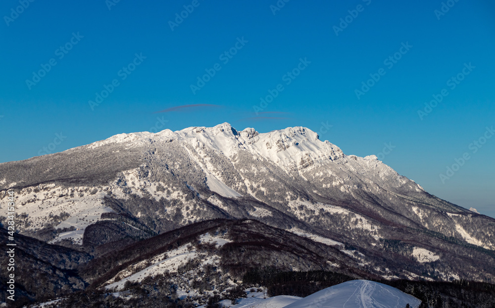 Fototapeta premium Snow covered mountains in winter