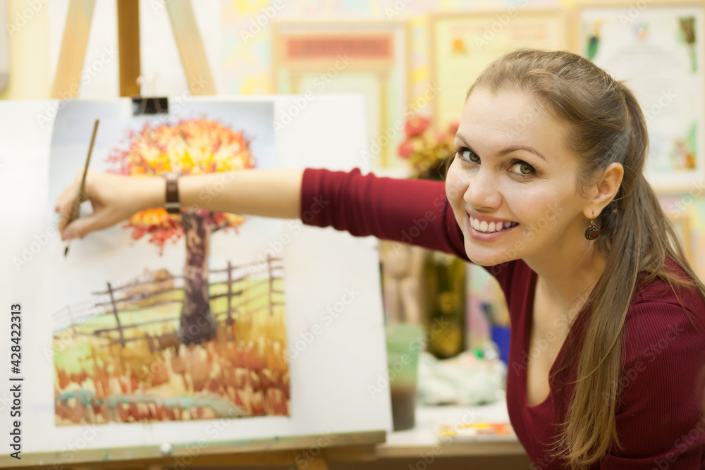 Watercolor painting with brush at the easel Stock Photo Adobe Stock