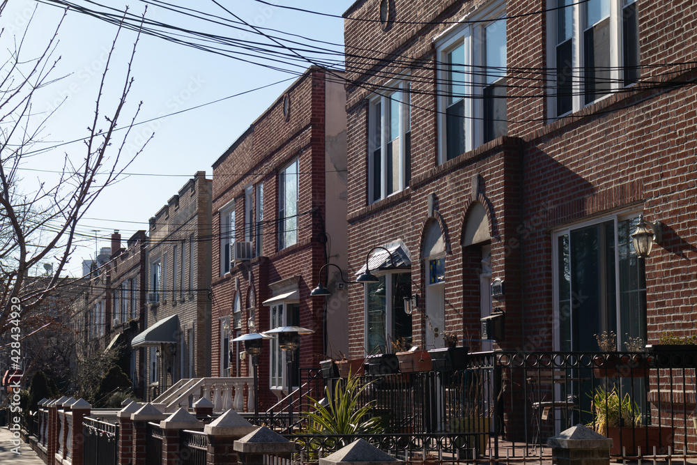 Row of Beautiful Old Brick Homes in Astoria Queens New York