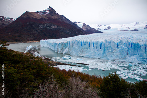 Perito Moreno Glaciar and its fragments in a cold lake