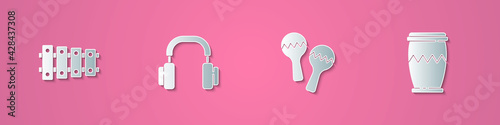 Set paper cut Xylophone, Headphones, Maracas and Drum icon. Paper art style. Vector