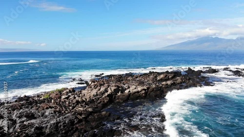 tracking left on strip of rocks going into the ocean off coast of Maui