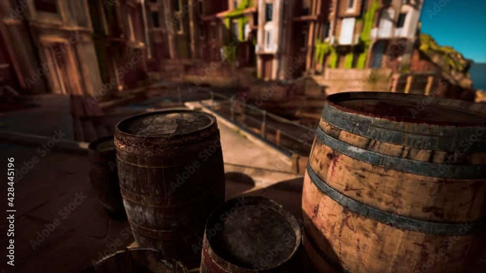 old wooden wine barrels in a sea town port