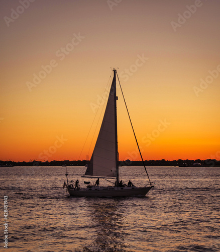 sailboat at sunset beautiful place sky color orange 